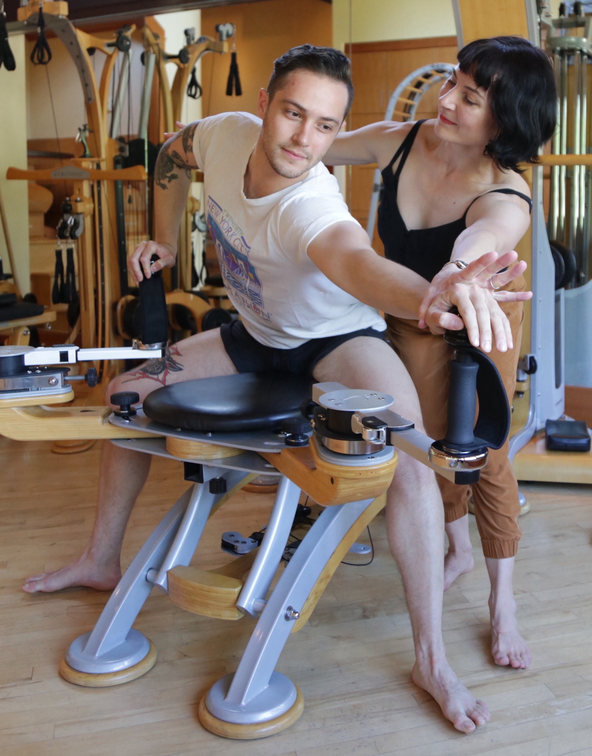 Heather Jackson Gyrotonic Trainer Heather Jackson instructor a client in the Gyrotonic Method on the Gyrotonic Pully Tower Unit